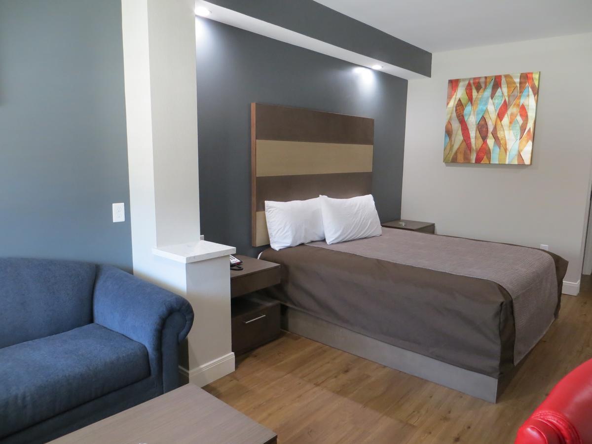 Grand Villa Inn & Suites Chinatown Хюстън Екстериор снимка