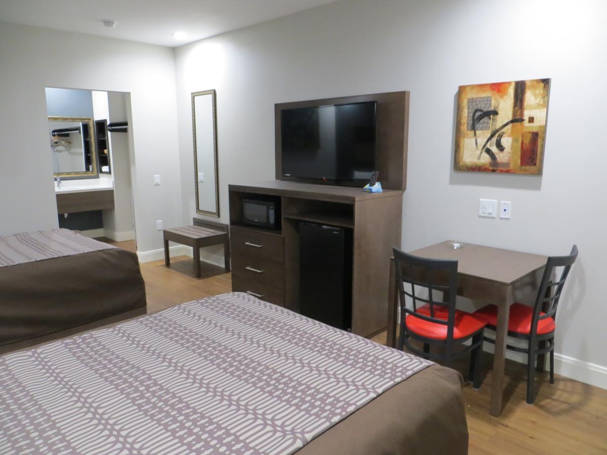 Grand Villa Inn & Suites Chinatown Хюстън Екстериор снимка