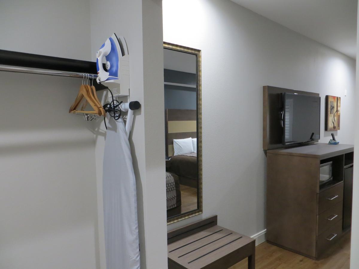Grand Villa Inn & Suites Chinatown Хюстън Екстериор снимка