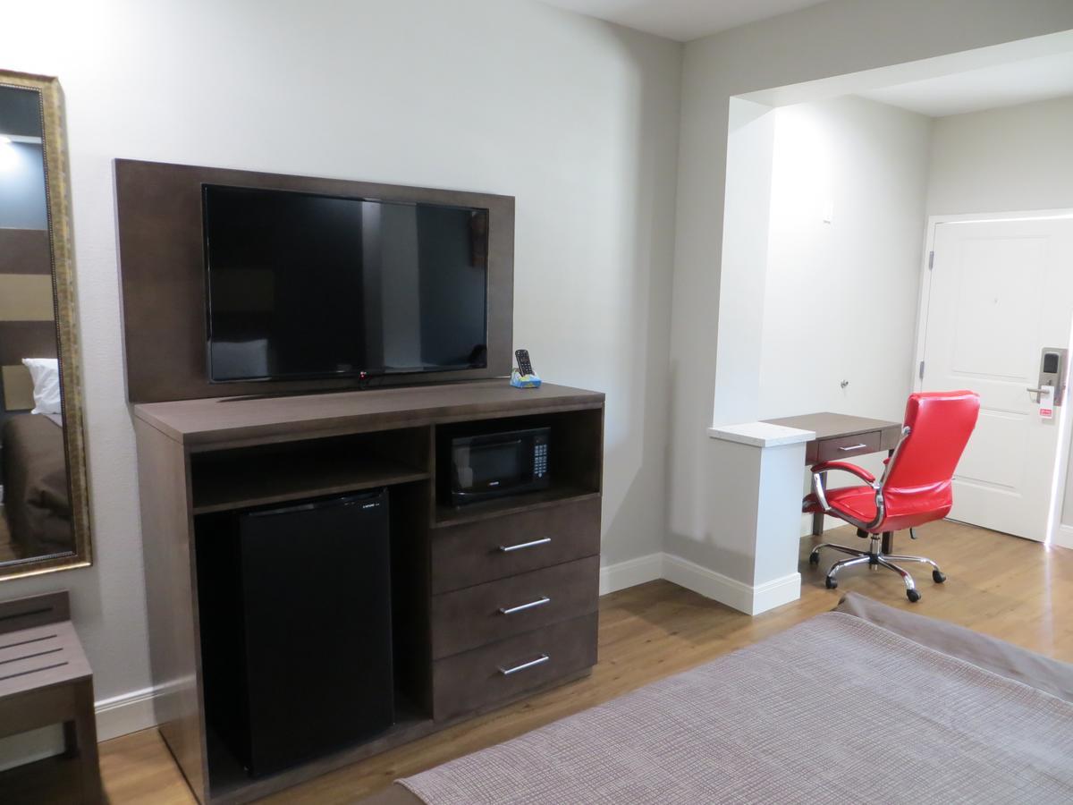 Grand Villa Inn & Suites Chinatown Хюстън Екстериор снимка