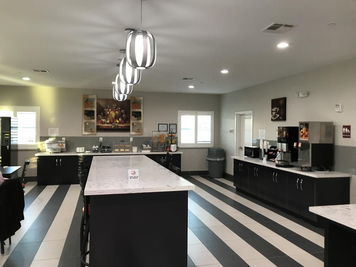 Grand Villa Inn & Suites Chinatown Хюстън Екстериор снимка