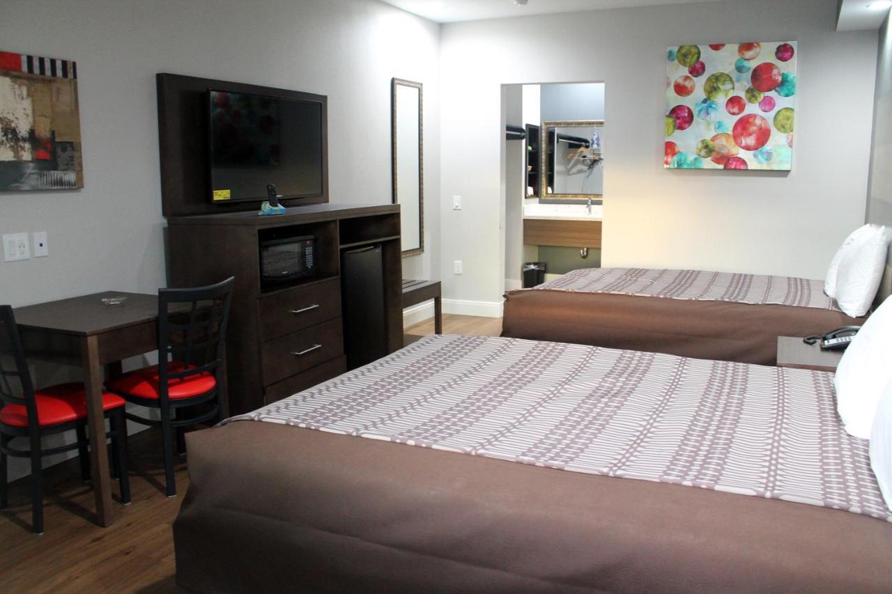 Grand Villa Inn & Suites Chinatown Хюстън Екстериор снимка