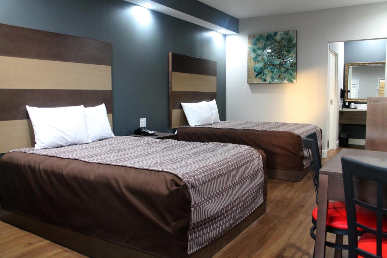 Grand Villa Inn & Suites Chinatown Хюстън Екстериор снимка